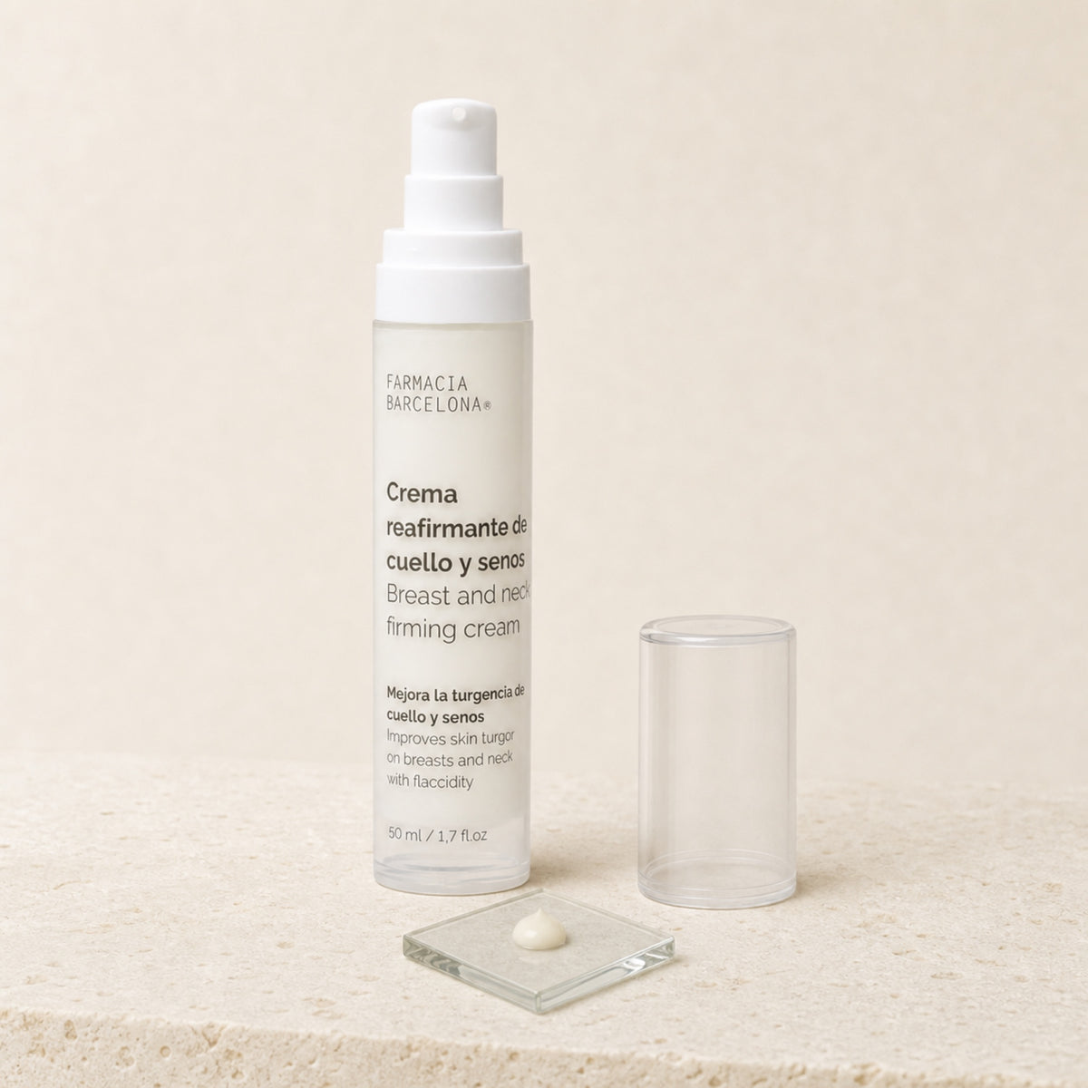 Crema Reafirmante Pecho y Cuello 50 ml. Detalle de apertura y textura del producto.
