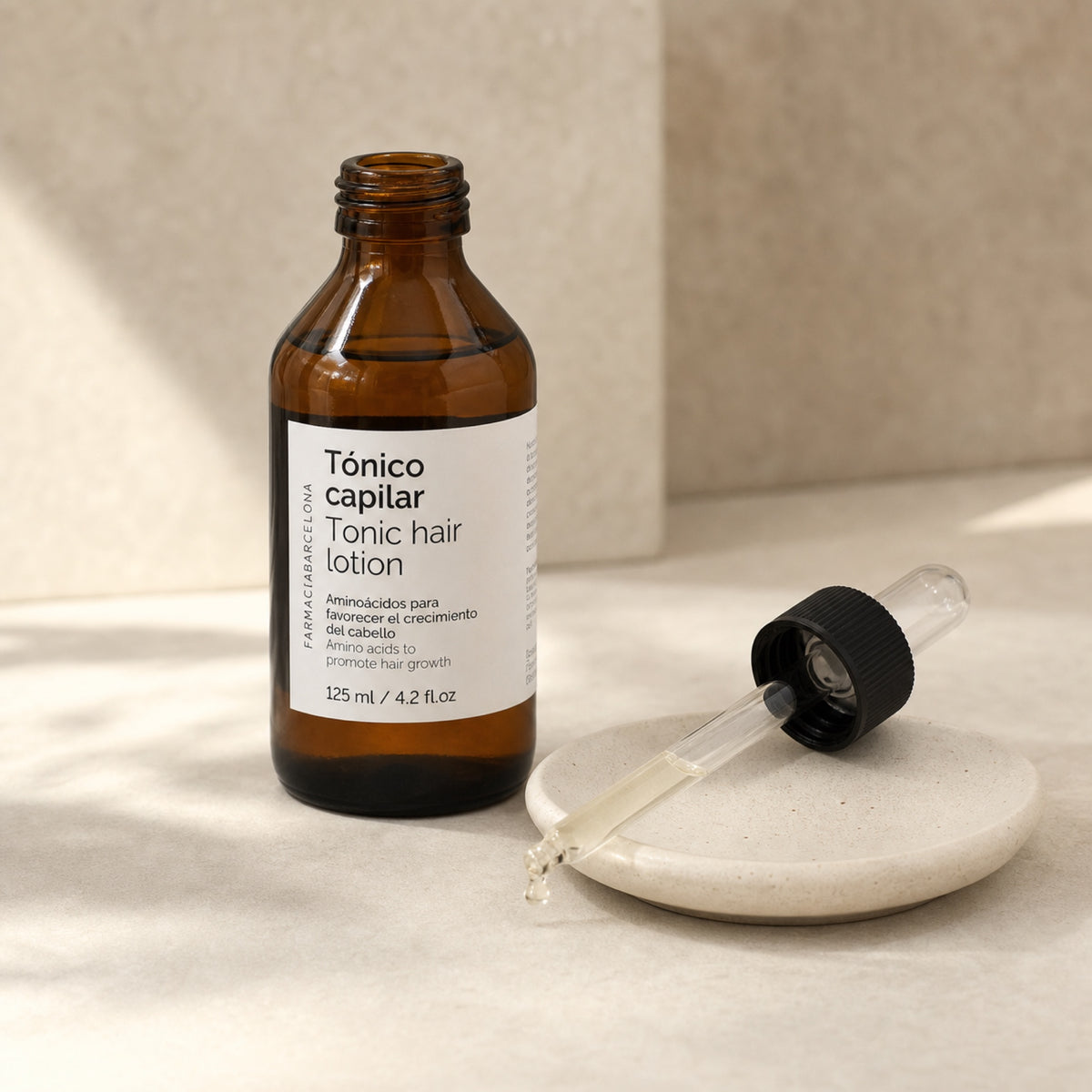 Tonic Hair Lotion 125 ml. Detalle de apertura y textura del producto.