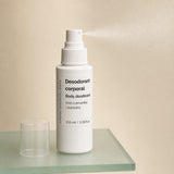 Desodorante Vaporizador Corporal 100 ml. Detalle de apertura y textura del producto.