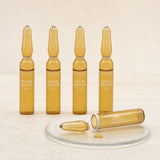 Fitocliganos 5% + Vit C 2%. Detalle de apertura y textura del producto.