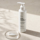 Leche Corporal Concentrada. Detalle de apertura y textura del producto.