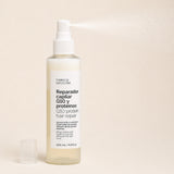 Spray Q10 Bi-Phase 200 ml. Detalle de apertura y textura del producto.